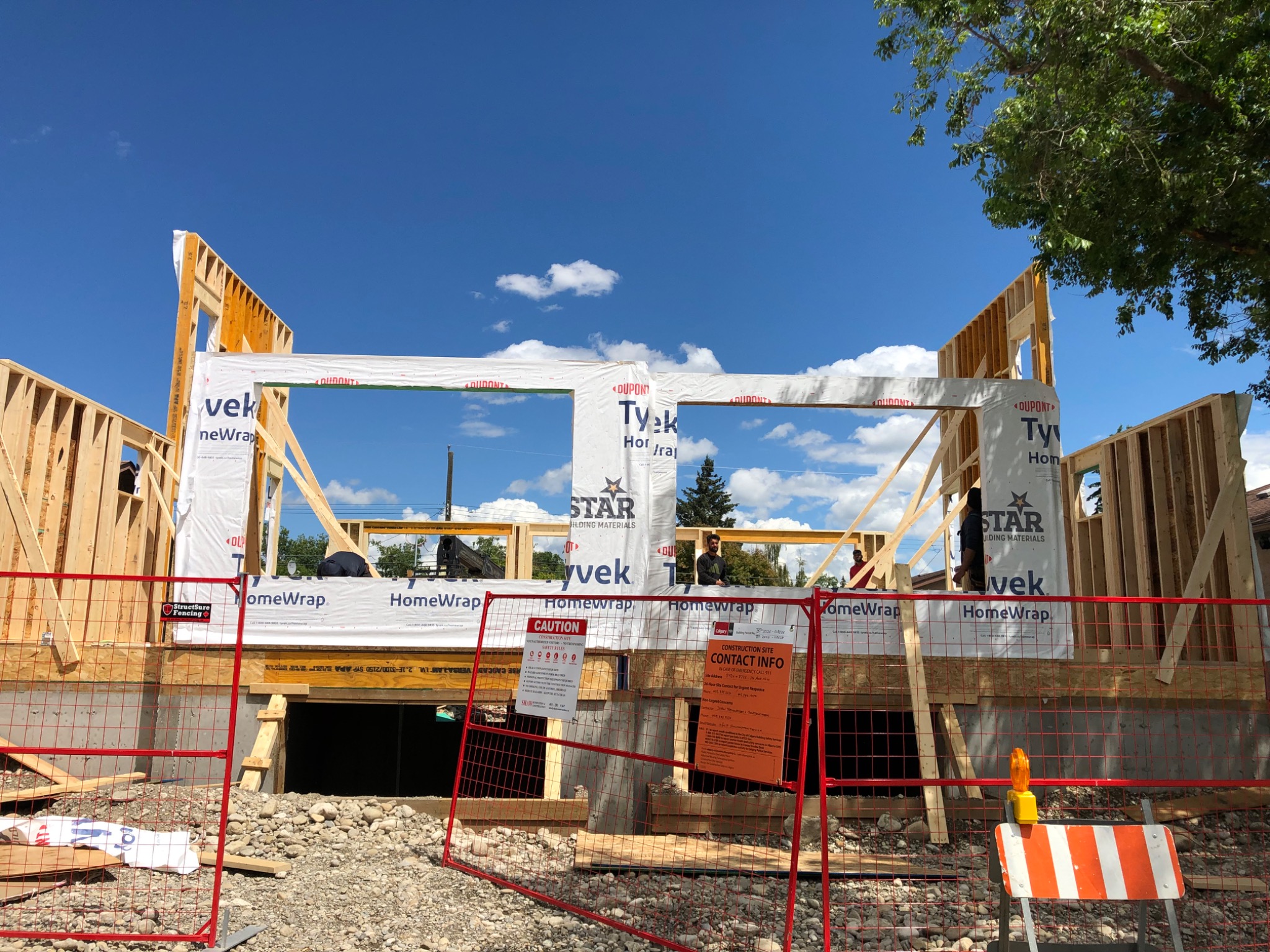 Calgary duplex under construction with custom window wells project thumbnail
